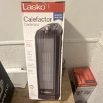 Lasko CT16450 1500W Ceramic Heater Black Oscillating 2-HEAT Dial 120V New. Price: $26.00.